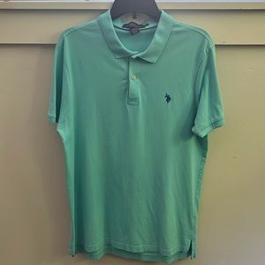 Mens aqua blue collared Polo shirt. Great condition. Size large.